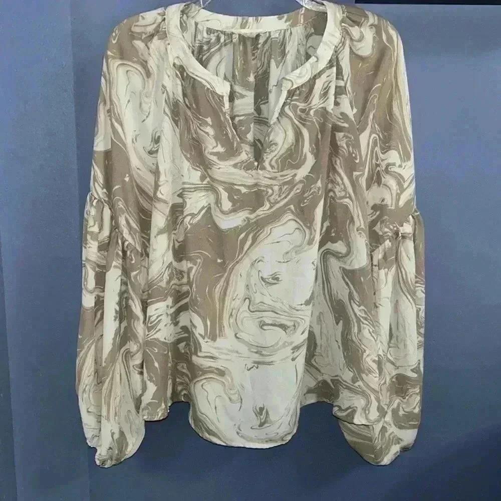 Polyester, size medium, cream, beige, and tan.